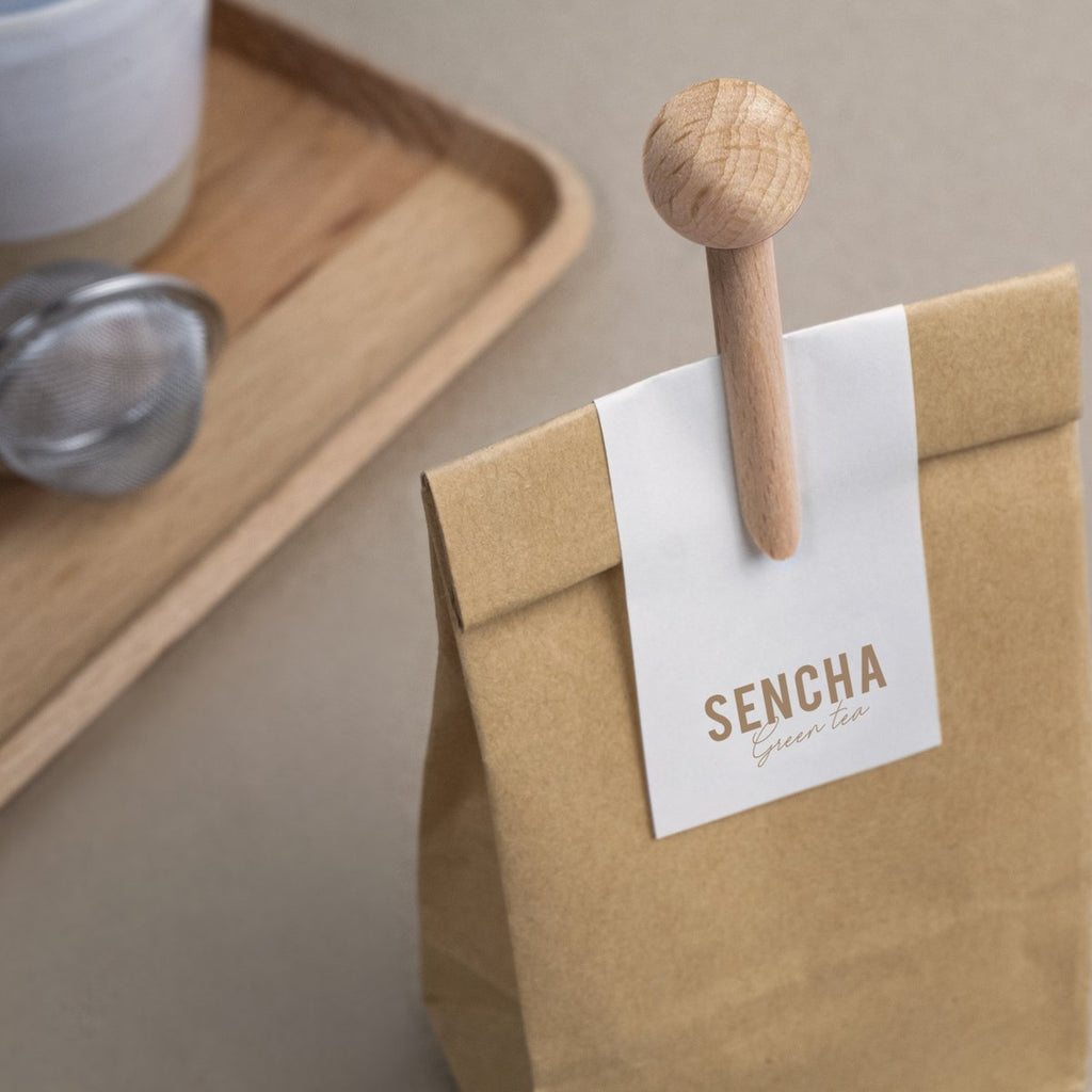 brown wooden bag clip on paper bag with the words sencha on it