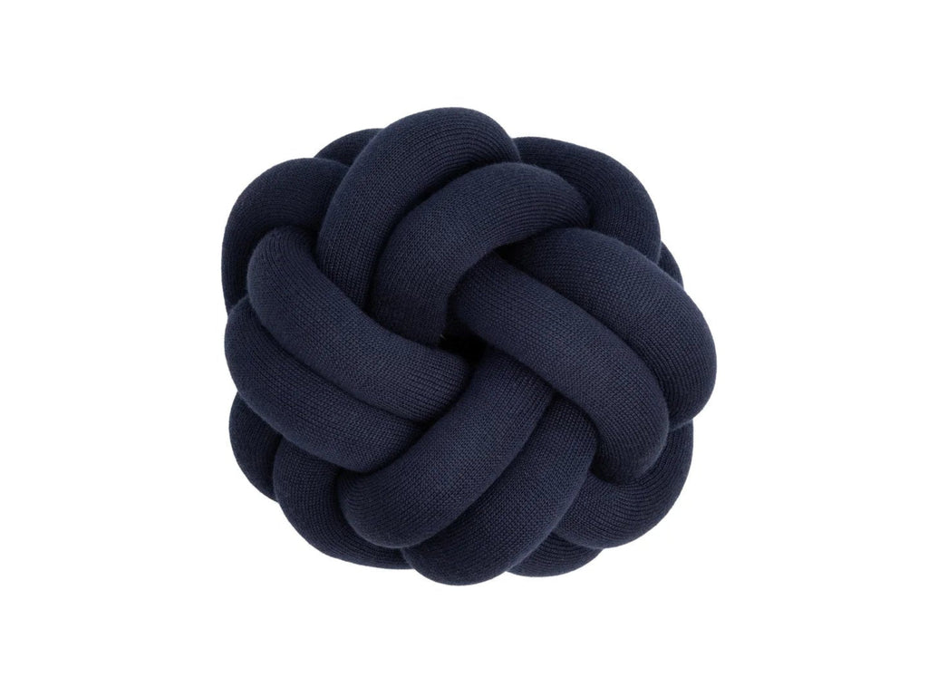 Navy blue knitted ball on a white background