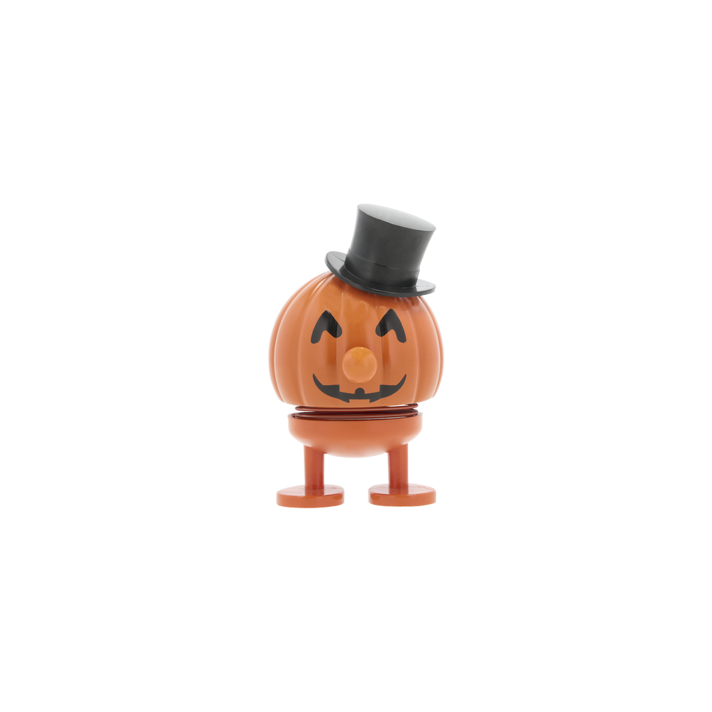 Pumpkin character with a top hat on a white background