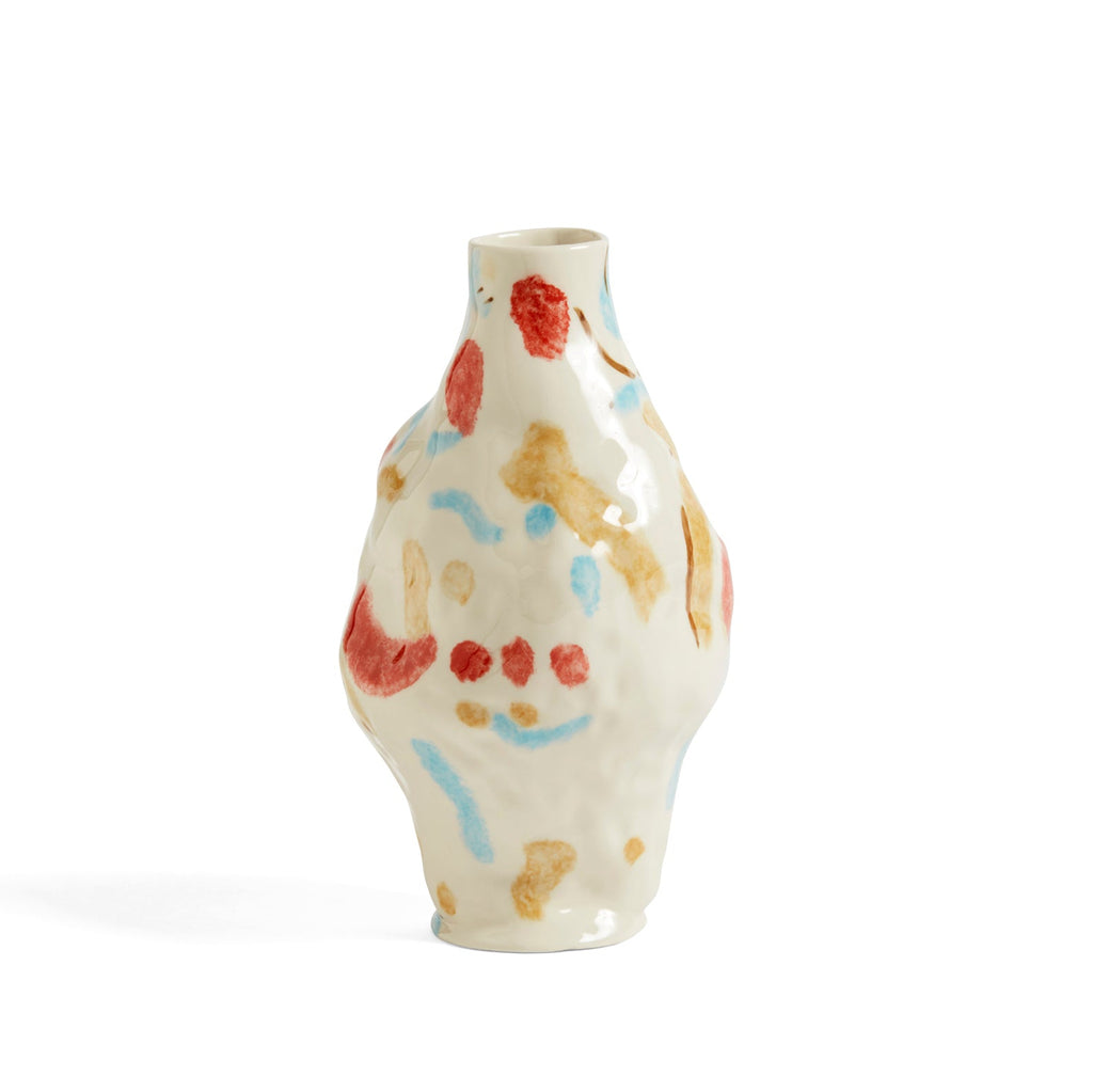 Decorative vase with colorful abstract patterns on a white background