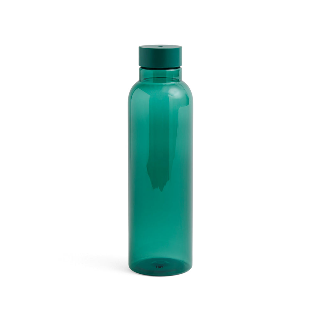 Green water bottle on a white background