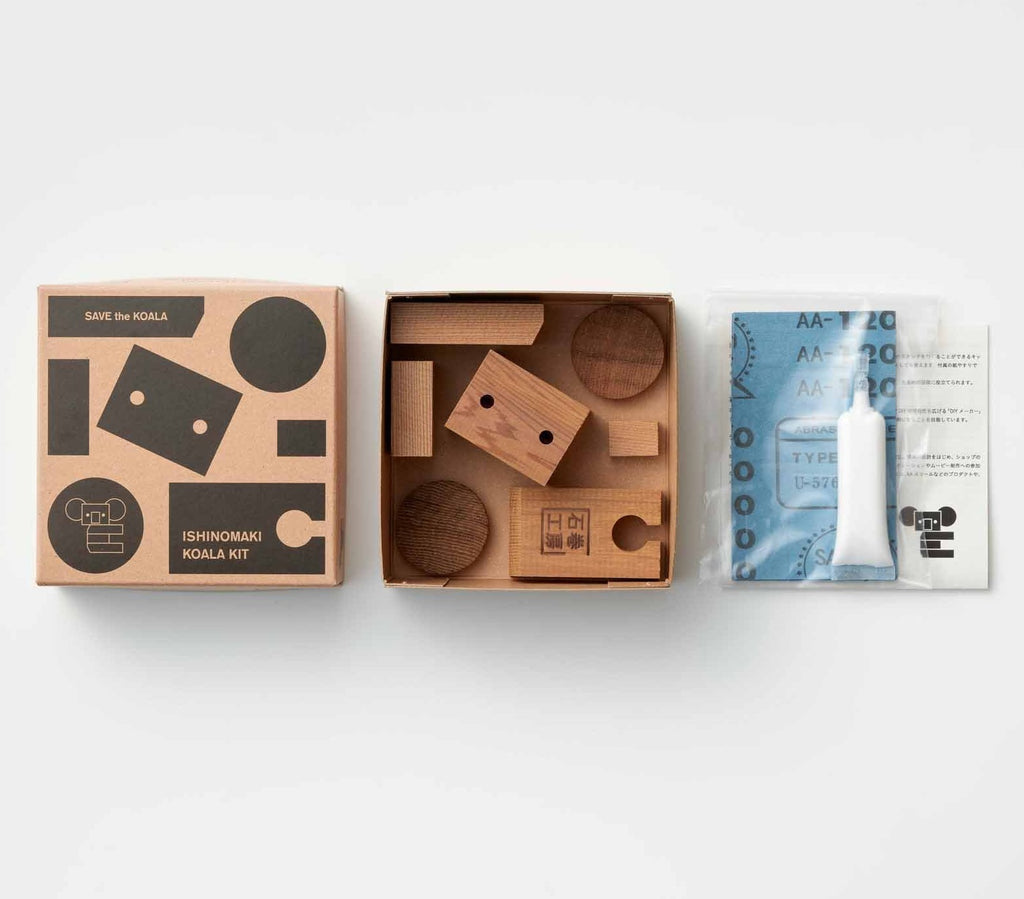 koala kit showing pieces, glue and sandpaper packaging