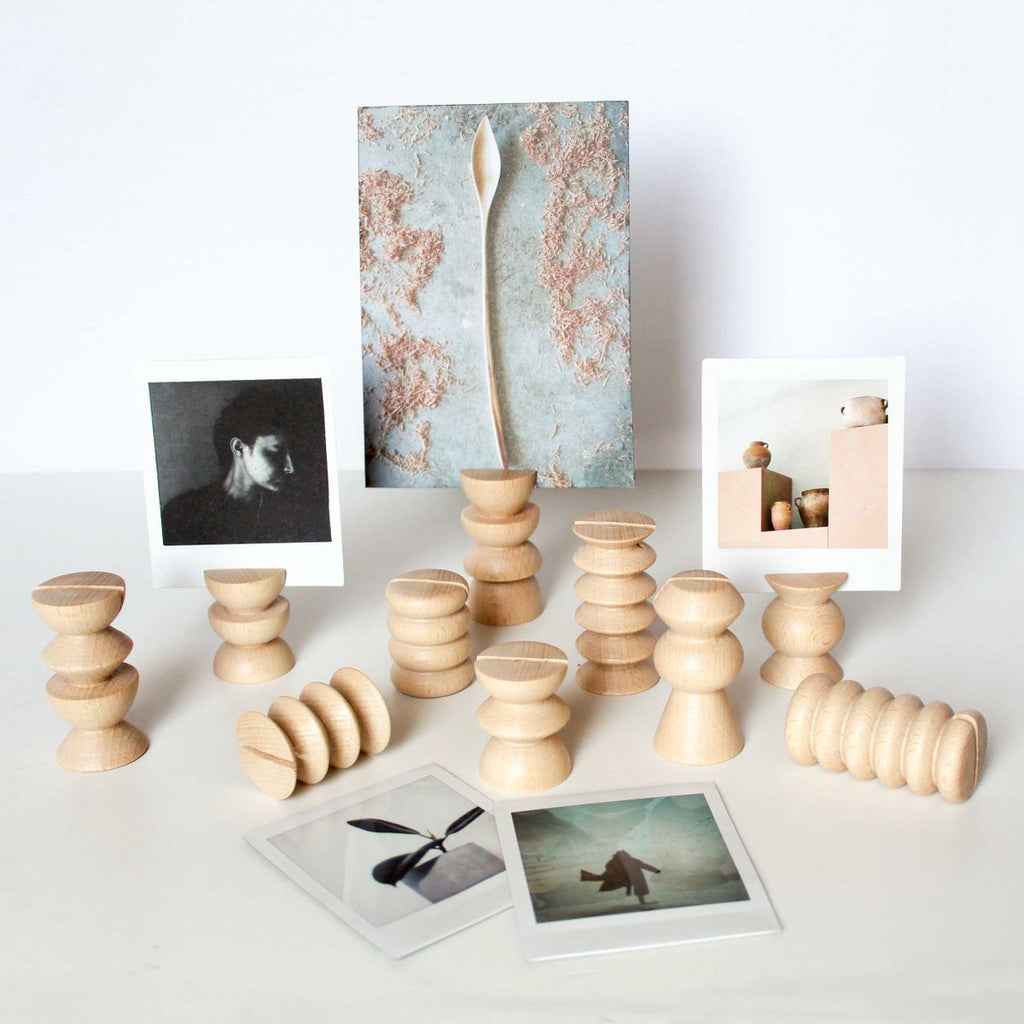 Wooden stands for polaroids.