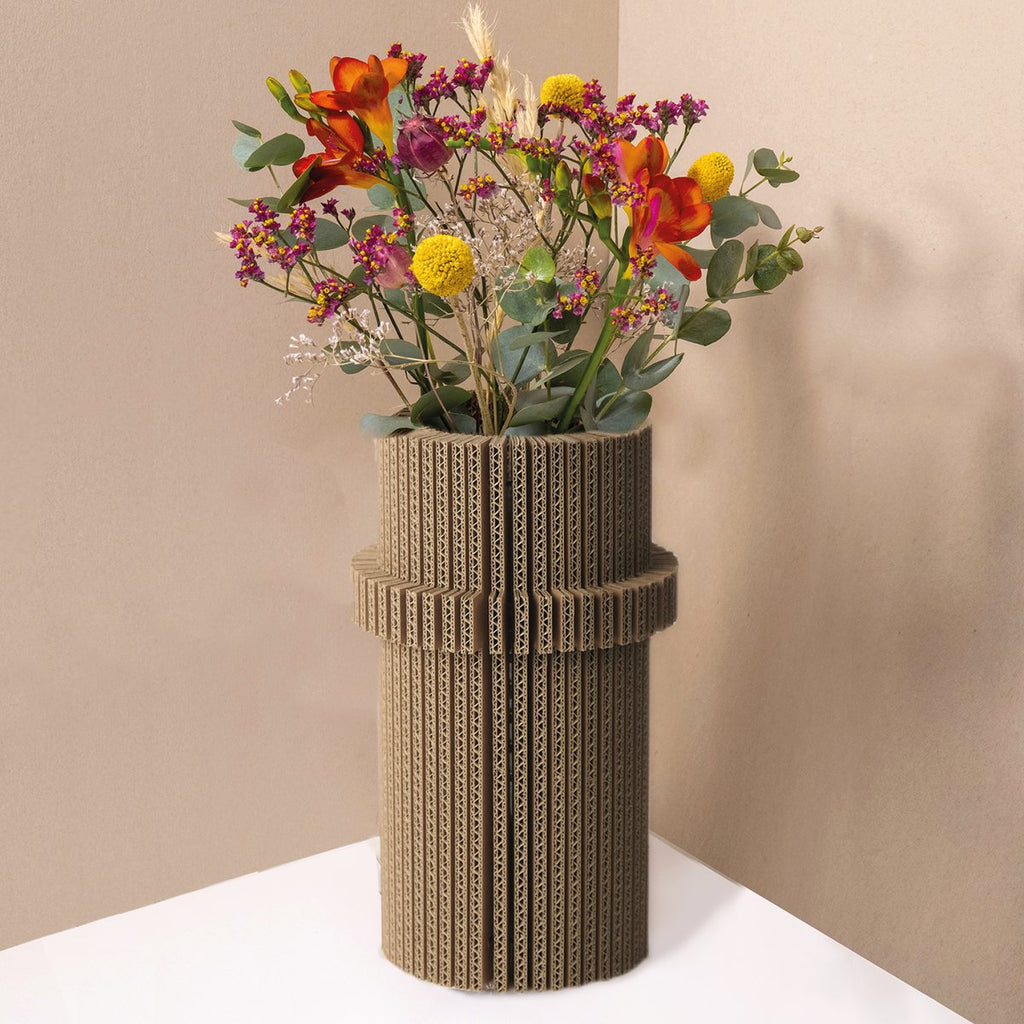 cardboard, sustainable vase with flower arrangement