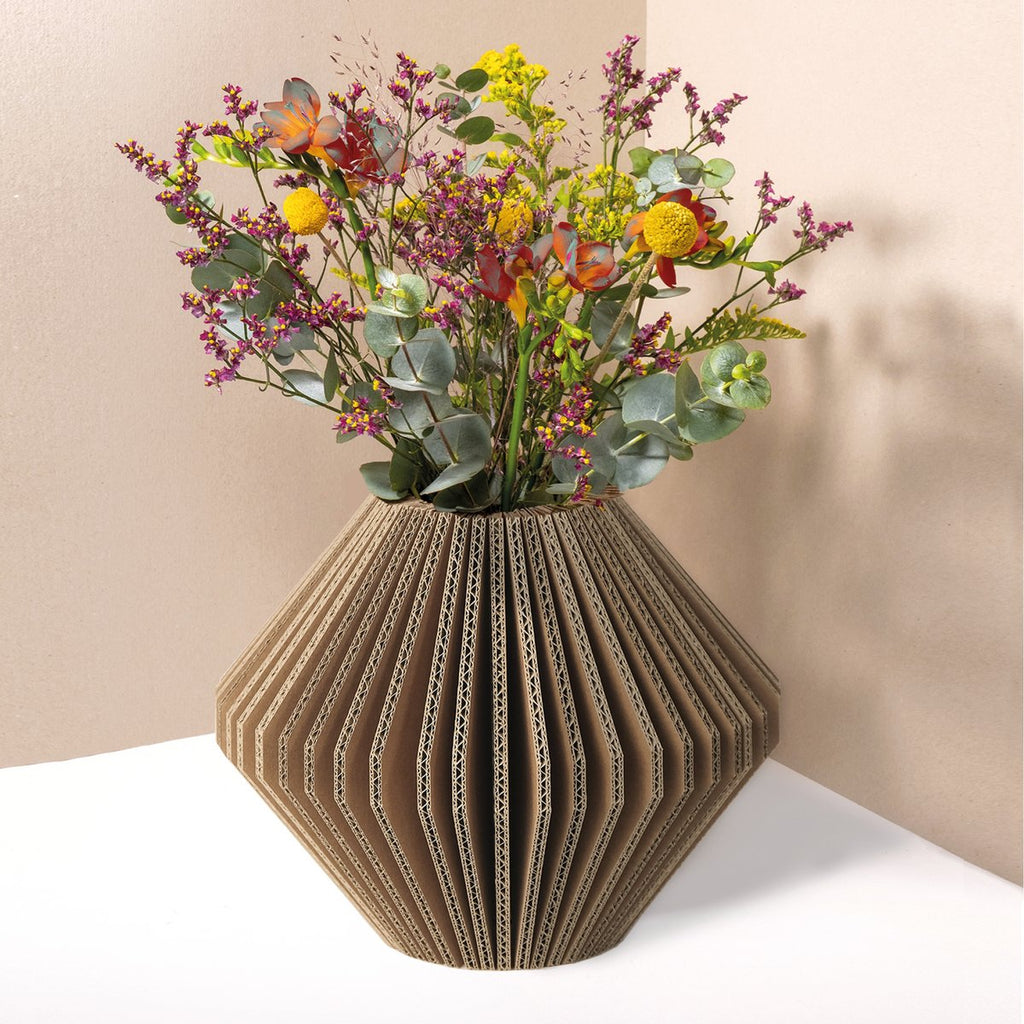 cardboard, sustainable vase with flower arrangement