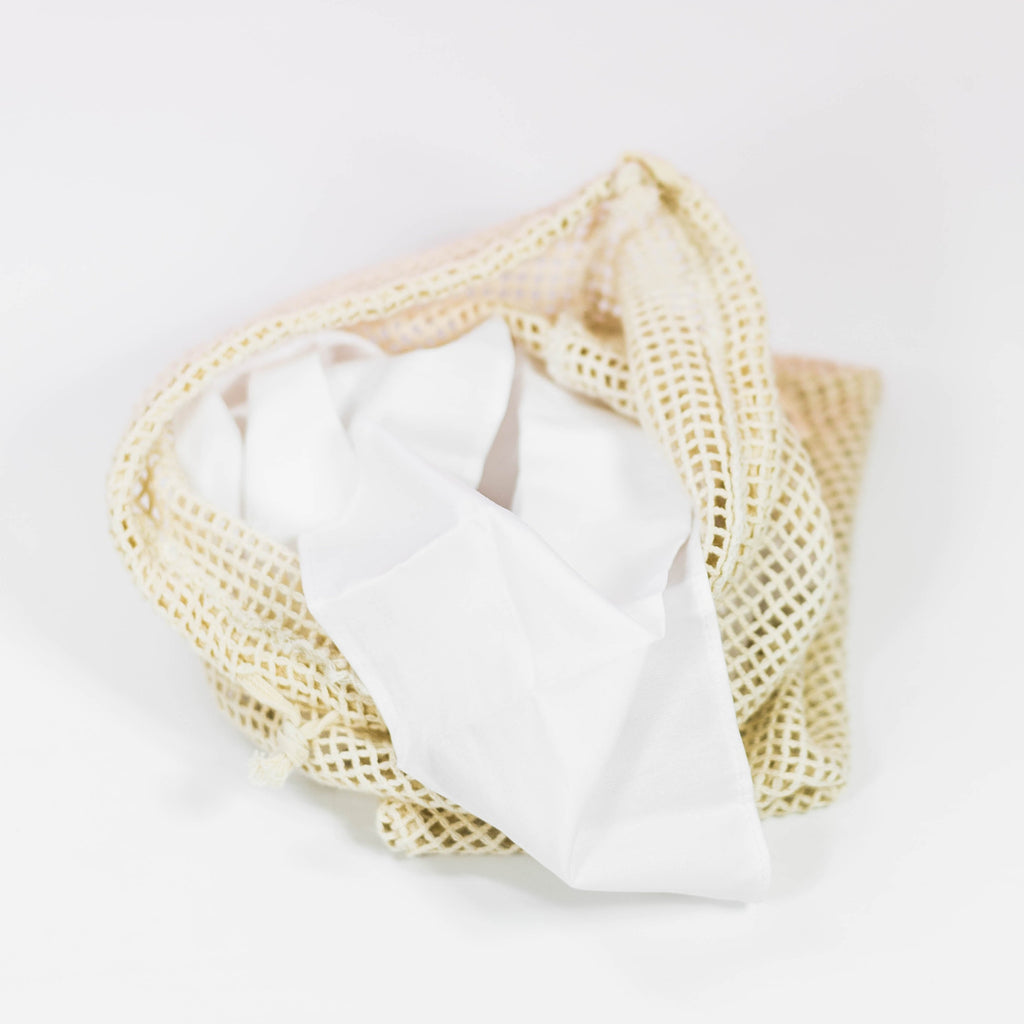 Laundry bag with cotton tissues inside